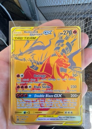 Reshiram & Charizard GX - SM247, graded 9.5