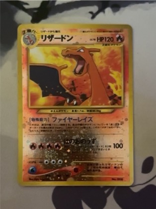 Charizard (6), graded 8.5