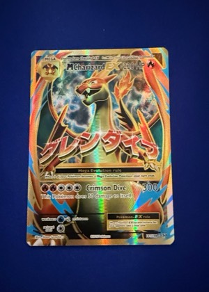 M Charizard EX (Full Art), graded 9.0
