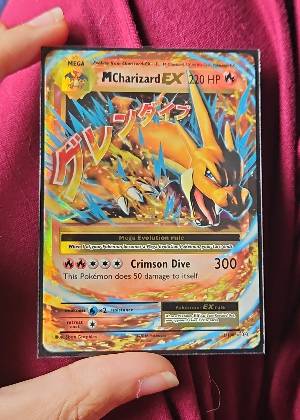 M Charizard EX graded 8