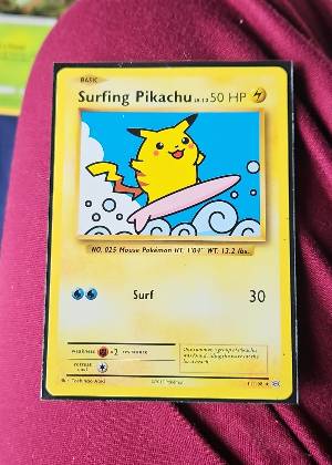Surfing Pikachu graded 8