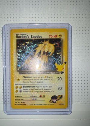 Rocket's Zapdos, graded 5.0