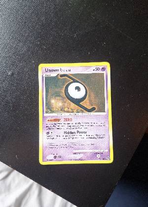 Unown [Z], graded 7.0