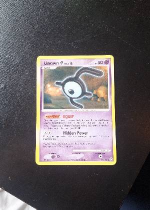 Unown [E], graded 9.0