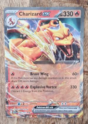 Charizard ex, graded 9.0