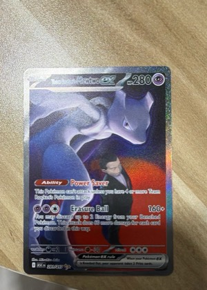Team Rocket's Mewtwo ex - 281/217 graded 6 & below