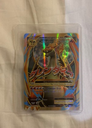 M Charizard EX (Full Art), graded 9.0