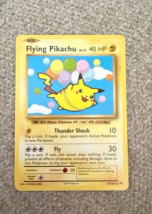 Flying Pikachu graded 8.5