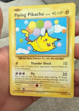 Flying Pikachu graded 6 & below