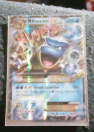 M Blastoise EX, graded 7.5