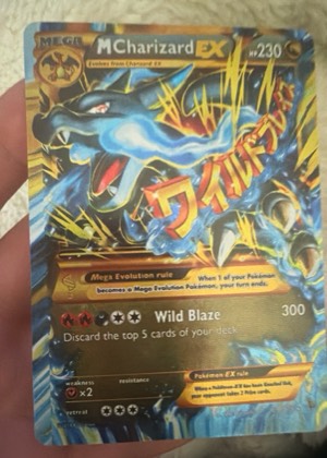 M Charizard EX (Y), graded 8.5