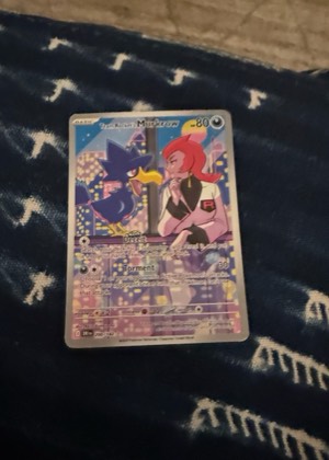 Team Rocket's Murkrow, graded 7.5