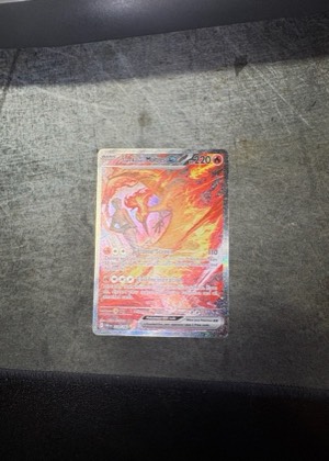 Team Rocket's Moltres ex, graded 9.0