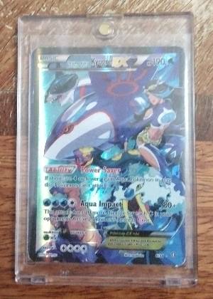 Team Aqua's Kyogre EX, graded 9.0