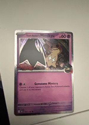 Team Rocket's Mimikyu, graded 9.0