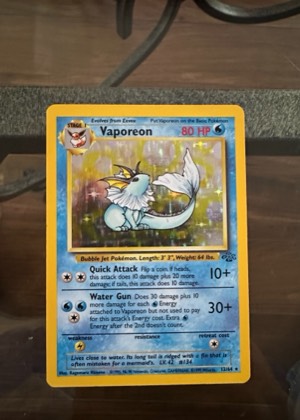 Vaporeon (12), graded 8.0