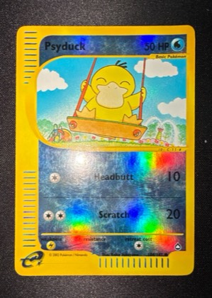 Psyduck, graded 6.0