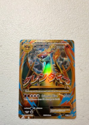 M Charizard EX, graded 9.0