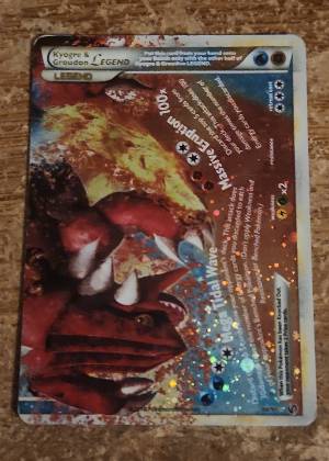 Kyogre & Groudon Legend (Bottom), graded 3.0