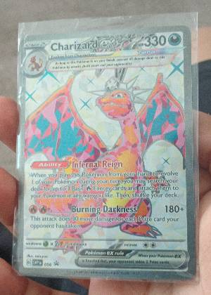 Charizard ex, graded 8.5