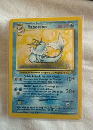 Vaporeon (12), graded 7.5