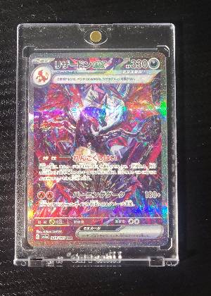 Charizard ex, graded 9.0