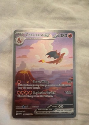 Charizard ex, graded 9.0
