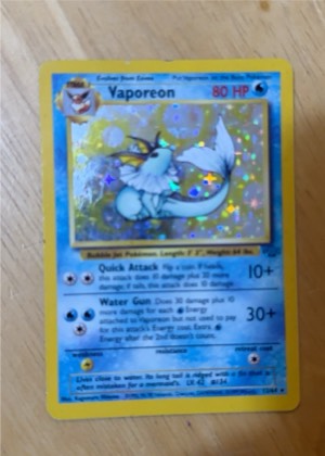 Vaporeon (12), graded 7.5