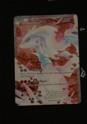Reshiram (Full Art), graded 2.5