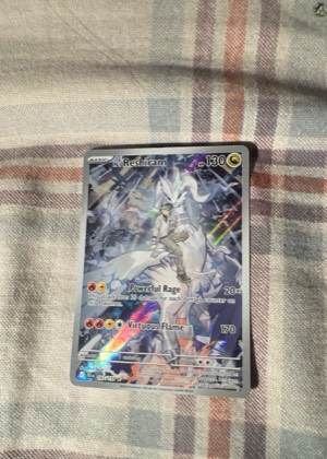 N's Reshiram, graded 9.0