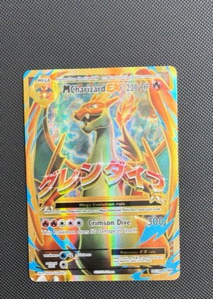 M Charizard EX, graded 9.0