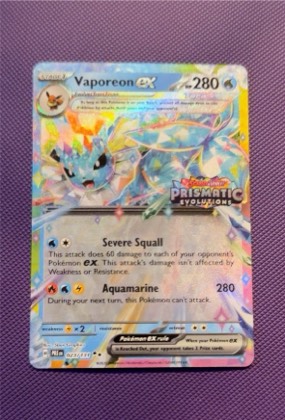 Vaporeon ex - 023/131 (Prismatic Evolutions Stamp) graded 6 & below