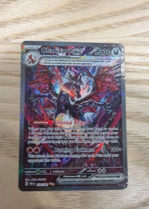 Charizard ex, graded 9.0