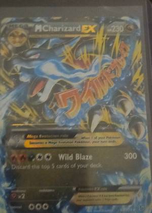 M Charizard EX (X) graded 8