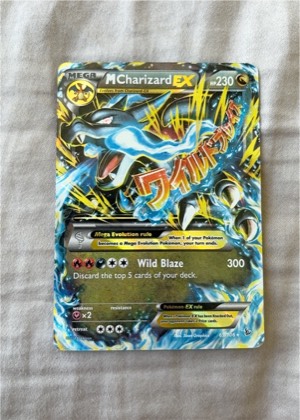 M Charizard EX (X), graded 7.5