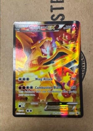 Charizard EX, graded 6.5