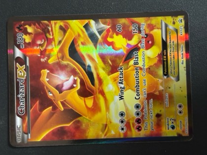 Charizard EX, graded 9.0