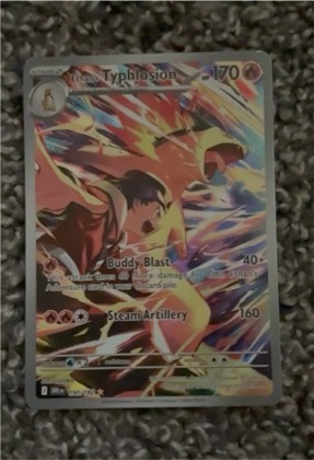 Ethan's Typhlosion graded 8