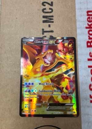 Charizard EX, graded 8.0