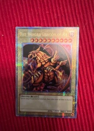 The Winged Dragon of Ra, graded 8.5