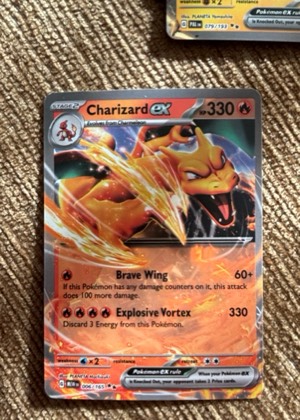 Charizard ex, graded 9.0