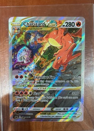 Charizard VSTAR, graded 9.0