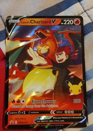 Lance's Charizard V, graded 5.5