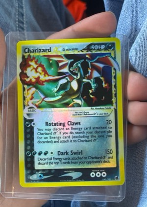 Charizard ☆ δ, graded 5.5