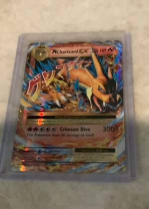 M Charizard EX, graded 2.5