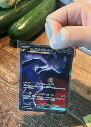 Team Rocket's Mewtwo ex, graded 8.5