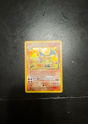 Charizard graded 7