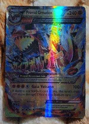 Primal Groudon EX (Omega), graded 4.0