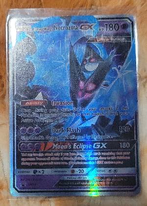 Dawn Wings Necrozma GX, graded 6.0