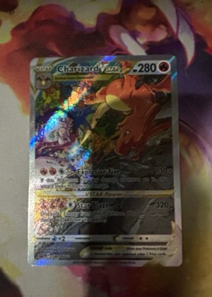 Charizard VSTAR (Secret), graded 8.0